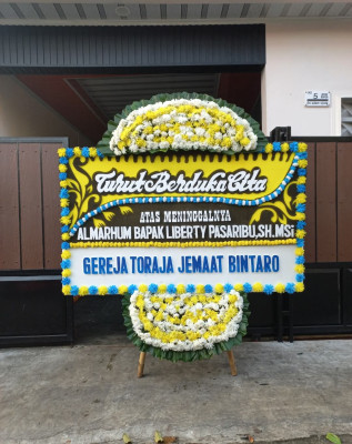 Papan Bunga Duka di Pasar Baru