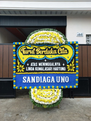 Papan Bunga Duka di Pasar Baru